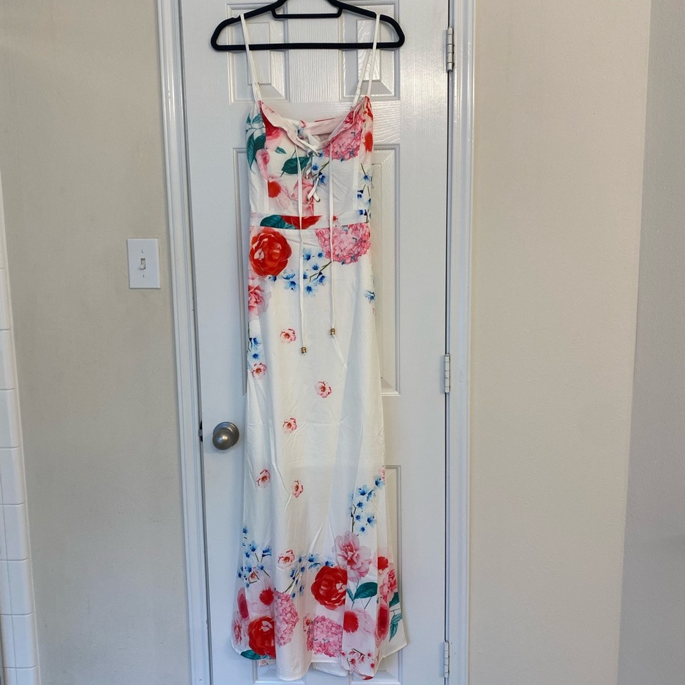 White sweetheart neckline maxi dress.